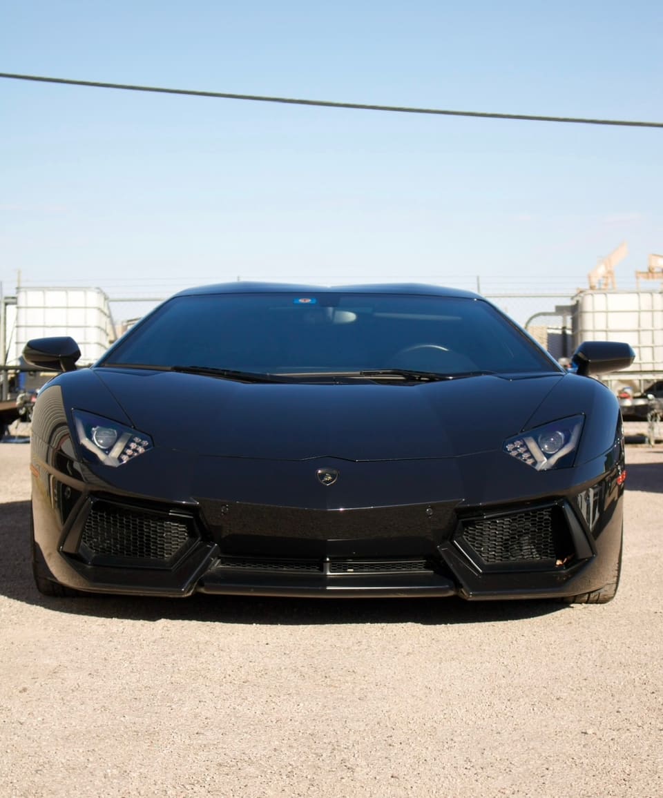 A black Lamborghini Aventador after detailing